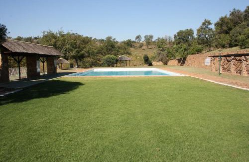 Buffelspoort Ski Chalet | Guest Rated Bietjie Bos Chalet with Oceanfront Pool Access