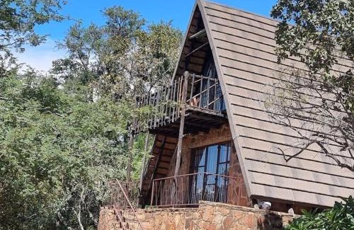 Buffelspoort Ski Chalet | Guest Rated Bietjie Bos Chalet with Oceanfront Pool Access