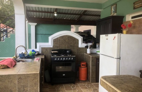 Omoa Villa | Spacious Beach House Steps from the Ocean with Pool