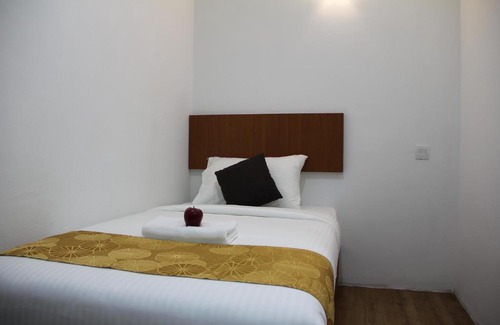Kampung Pas Tumpang Hotel | Kid-Friendly Big Apple Hotel - Rated 8/10 by Guests