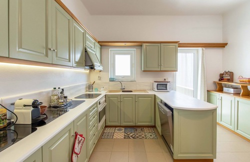 Piso Livadi Apartment | Family-Friendly Big Blue Apartment with Oceanfront Pool