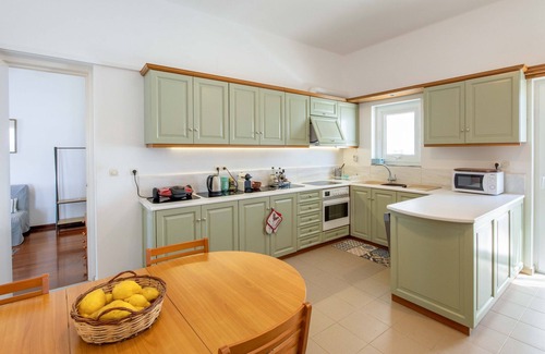 Piso Livadi Apartment | Family-Friendly Big Blue Apartment with Oceanfront Pool