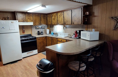 Bronson House | Big Fish Cabins - Cozy Retreat with Pool & Lake View