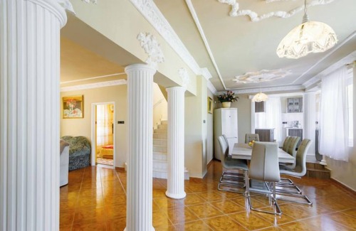 Balatonfoldvar House | Inviting Big Thuja Retreat with Ocean Views and Spa Access