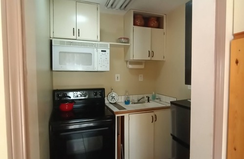 Happy Camp Cabin | Cozy Escapes at Bigfoot RV & Cabins Park, Pet Friendly!