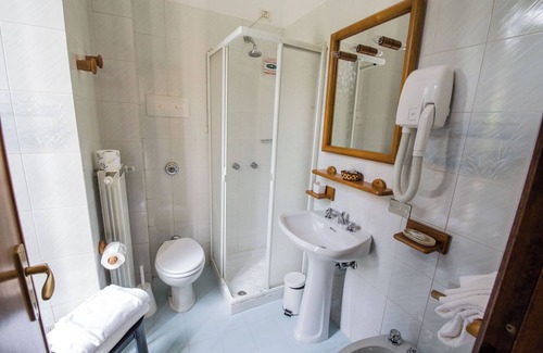 San Pellegrino Terme Hotel | Eco-Friendly Bigio Hotel: Spa and Family Amenities Await