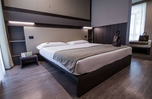 San Pellegrino Terme Hotel | Eco-Friendly Bigio Hotel: Spa and Family Amenities Await