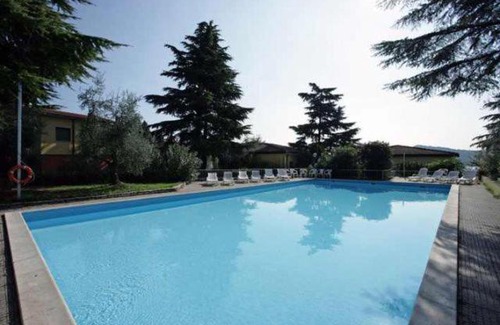 Villaggio Sanghen Apartment | Cozy BILOCALE with Ocean View and Family-Friendly Amenities