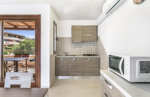 Portisco Apartment | Inviting Bilocale Asfodeli 2 with Ocean View Amenities