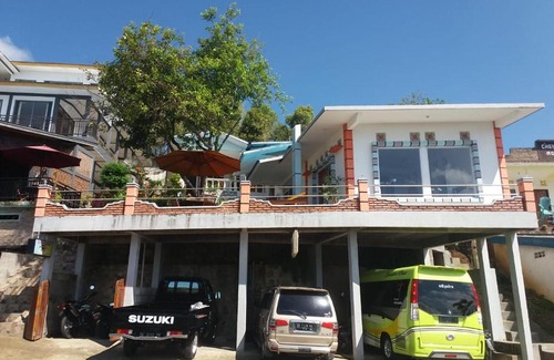 Moni House | Discover Bintang Bungalow: Oceanfront with Pool & Breakfast