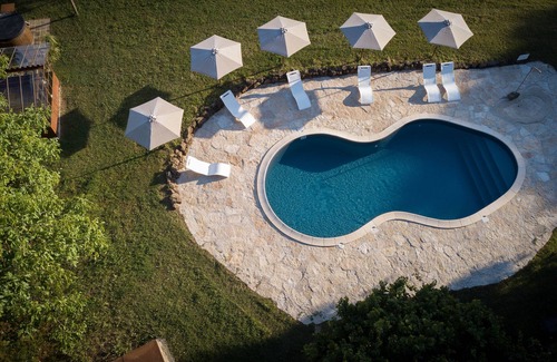 Sorano RV Rental | Unique Bio Glamping Toscana Tents with Pool & Spa Amenities