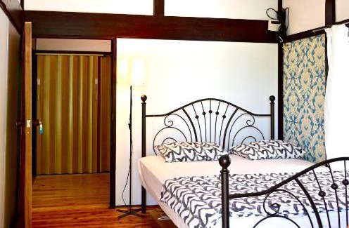 Tatsugo Cabin | Relax at Birdland Nature Resort: Pool, Sauna & Ocean Views