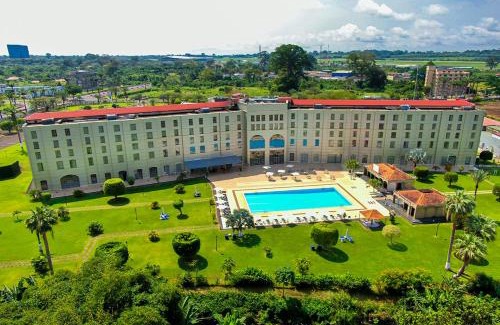 Malabo Hotel | Relax at Bisila Palace: Oceanfront Escape with Pool & Spa