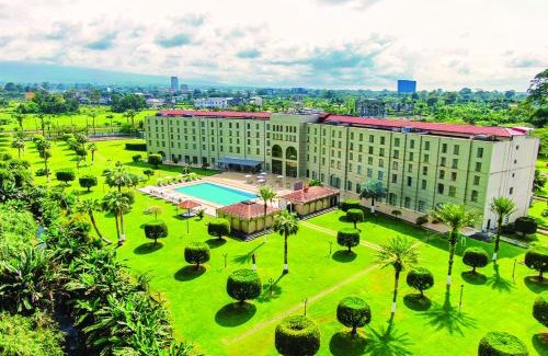Malabo Hotel | Relax at Bisila Palace: Oceanfront Escape with Pool & Spa