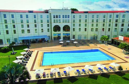 Malabo Hotel | Relax at Bisila Palace: Oceanfront Escape with Pool & Spa