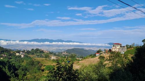 Nagarkot Apartment | Enchanting BJ's Farmhouse with Cozy Fireplace for Families