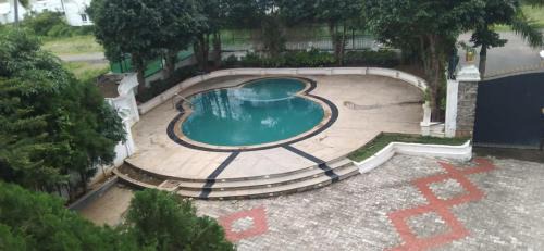 Courtallam Resort | Discover BKR Resorts: Pet-Friendly Getaway with Spa & Pool