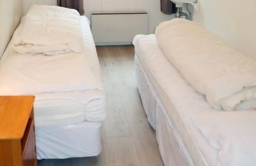 Hyllestad House | Experience Blåsenberg by Interhome: Oceanfront Bliss