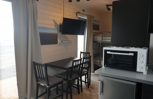orlakshofn Cottage | Cozy Black Beach Cottage with Breakfast & Family Amenities