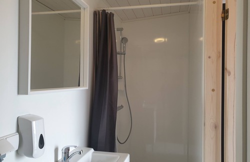 orlakshofn Cottage | Cozy Black Beach Cottage with Breakfast & Family Amenities