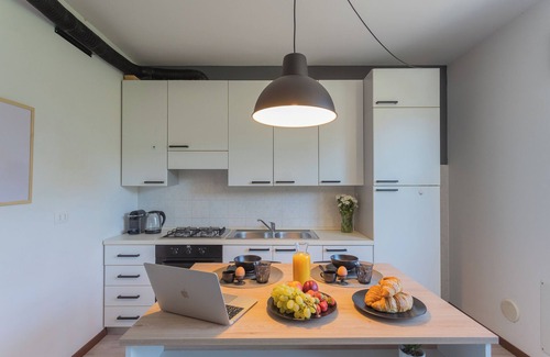 Albate Apartment | Black Loft Como - Cozy Studio with Spa & Pet-Friendly Perks
