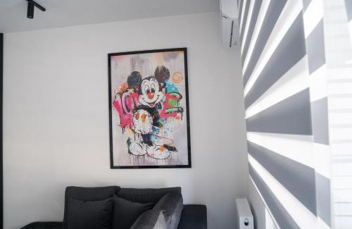 Ilisia Apartment | Black & White 2BR Apt steps from Mavili Square