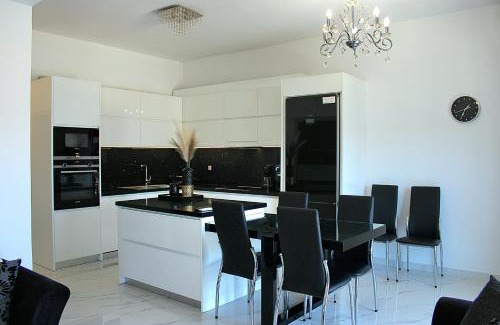 Korithion Apartment | Seaside Bliss at BLACK & WHITE House Kalamia - 4 Star Gem