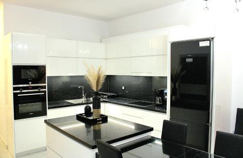 Korithion Apartment | Seaside Bliss at BLACK & WHITE House Kalamia - 4 Star Gem