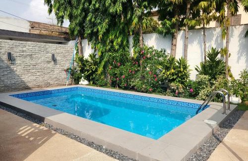 Lome House | Tranquil Getaway in Oceanfront Garden with Pool