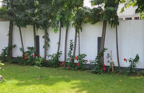 Lome House | Tranquil Getaway in Oceanfront Garden with Pool