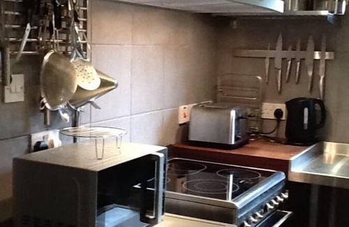 Drumbeg House | Discover Blar na Leisg Lodge: Family Retreat with Hot Tub