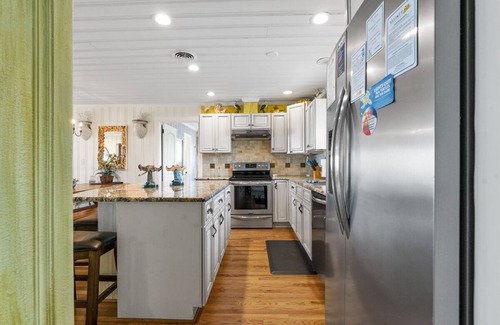 Cherry Grove Beach House | Oceanfront Bliss: Poolside Retreat in Cherry Grove