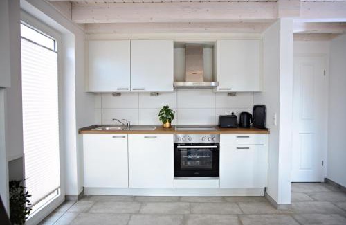 Nordhorn House | Discover Blinkfüer: 4-Star Retreat with Child-Friendly Amenities