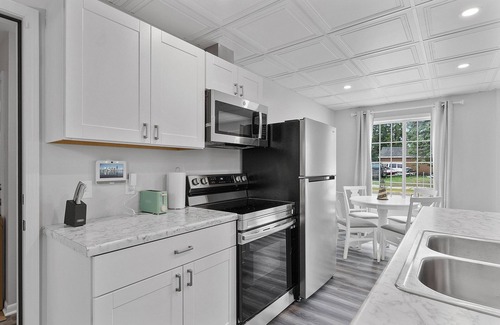 Two Rivers Apartment | Beachside Blissful Duplex with Spa & Hot Tub - 10/10 Rated