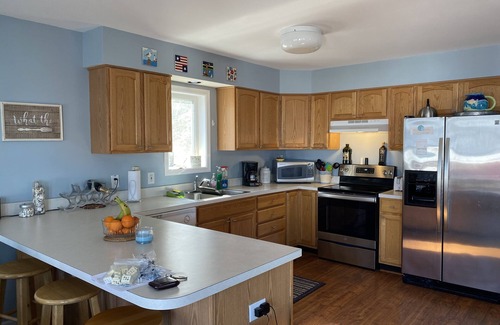 Calvert Beach-Long Beach House | Steps from the Beach: Relax and Play in Our Game Room