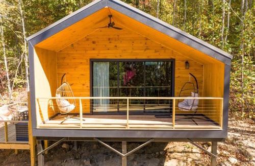 Wildwood House | Blooming Redbud Treehouse with private hot tub