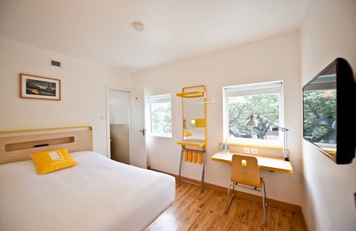 Indiranagar Hotel | Discover Bloomrooms @ Indiranagar: Family-Friendly Retreat