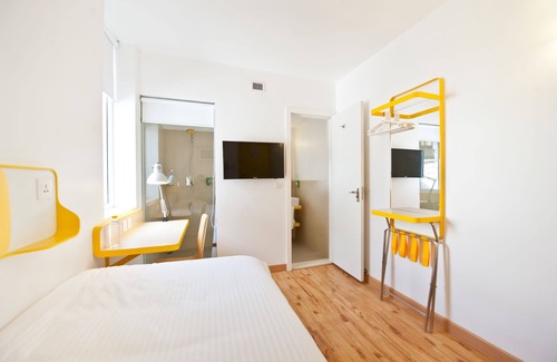 Indiranagar Hotel | Discover Bloomrooms @ Indiranagar: Family-Friendly Retreat