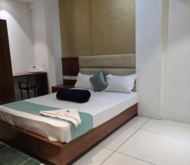 Kozhikode Hotel | Blossom suites