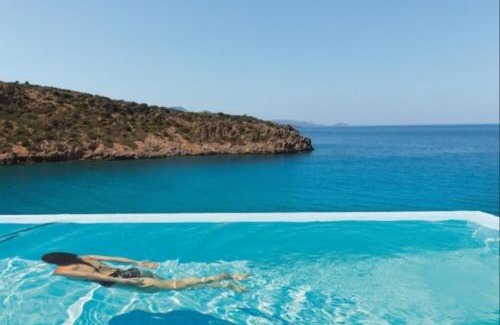 Porto Tricase Ski Chalet | Cozy Blu Suite Cottage with Pool and Oceanfront Views