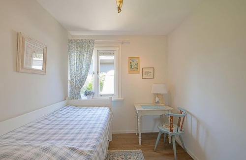 Julianadorp aan zee House | Relax at Blue Bay Cottage - Pet Friendly Escape in Julianadorp