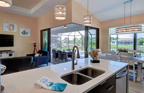 Pine Valley House | Tranquil Blue Bayou: Riverfront Oasis with Pool & Views