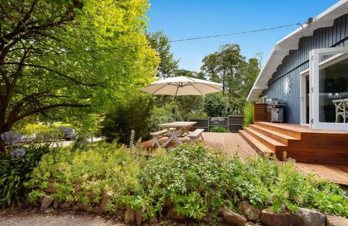 Shoreham House | Cozy Blue Beachside Retreat: Pet-Friendly Comfort Awaits