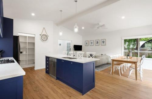 Shoreham House | Cozy Blue Beachside Retreat: Pet-Friendly Comfort Awaits