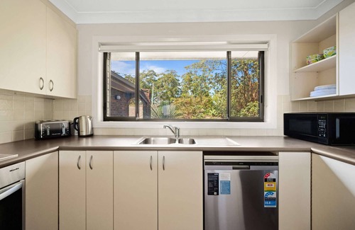 Terrigal House | Blue Bird Hotel: Oceanview Escape with Fireplace & Pet Welcome