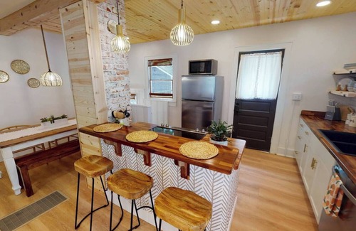 Wichita House | Bright Blue Bungalow: Rated 10/10 with Spa & Family Amenities