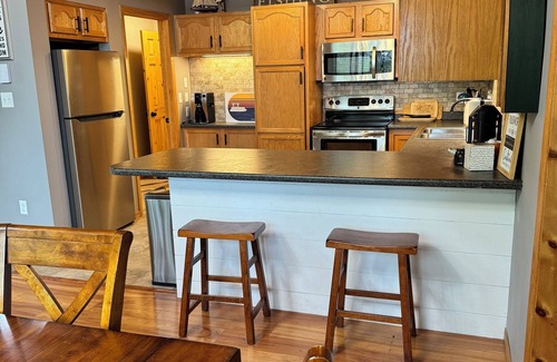 Minong House | Experience Blue Chair Bay: Beachfront Bliss on Minong Flowage