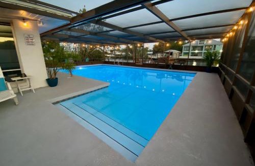 Ruskin House | Experience Blue Heron House: 4 BR Waterfront Retreat with Pool