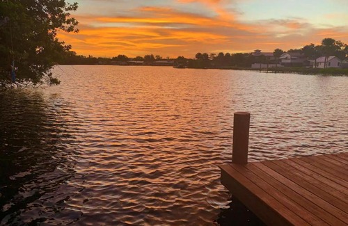Ruskin House | Experience Blue Heron House: 4 BR Waterfront Retreat with Pool