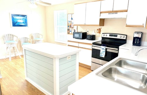 Cudjoe Key House | Beautiful Blue Vacation Home with Private Heated Pool